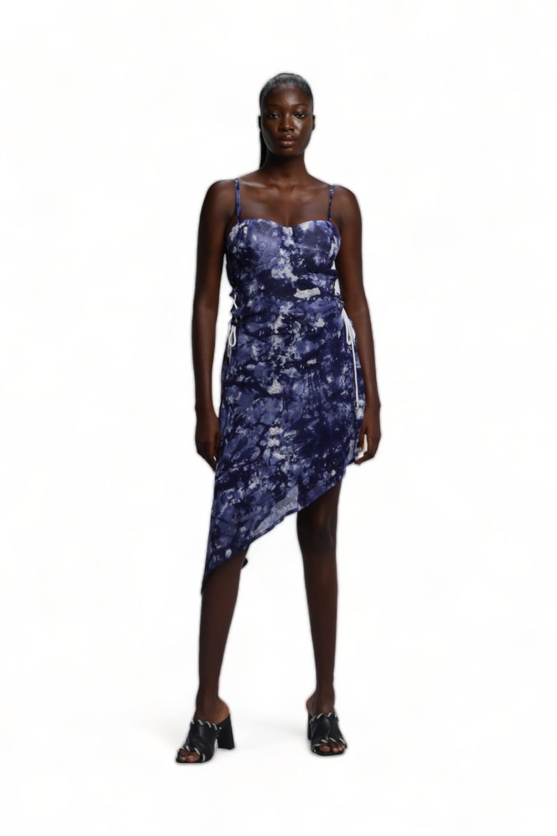 Front view of the Cute-saint navy and white cloud-print Atunse Dress with an asymmetrical hem.