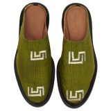 Top-down view of Bata Mules in olive green textile featuring two white graphic logos on the upper and brown leather lining.